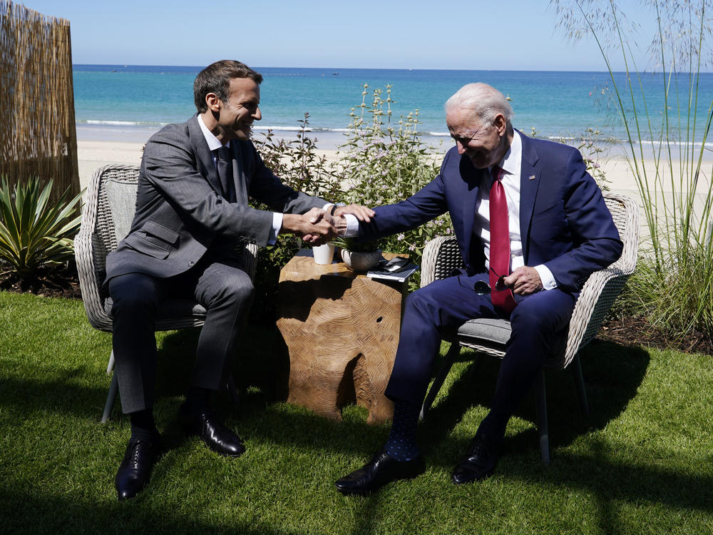 President Biden and French President Emmanuel Macron met on the sidelines. 