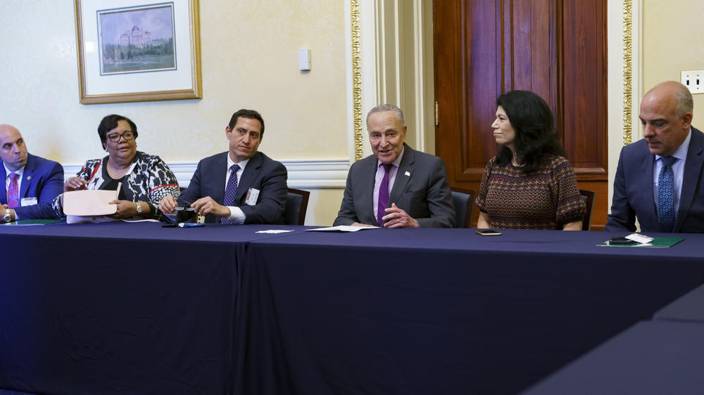 Senate Majority Leader Chuck Schumer, D-N.Y., is flanked by Texas Rep. Trey Martinez Fischer left, and Texas Sen. Carol Alvarado of Houston, right, as he meets with Texas Democratic lawmakers to discuss voting rights Tuesday on Capitol Hill.