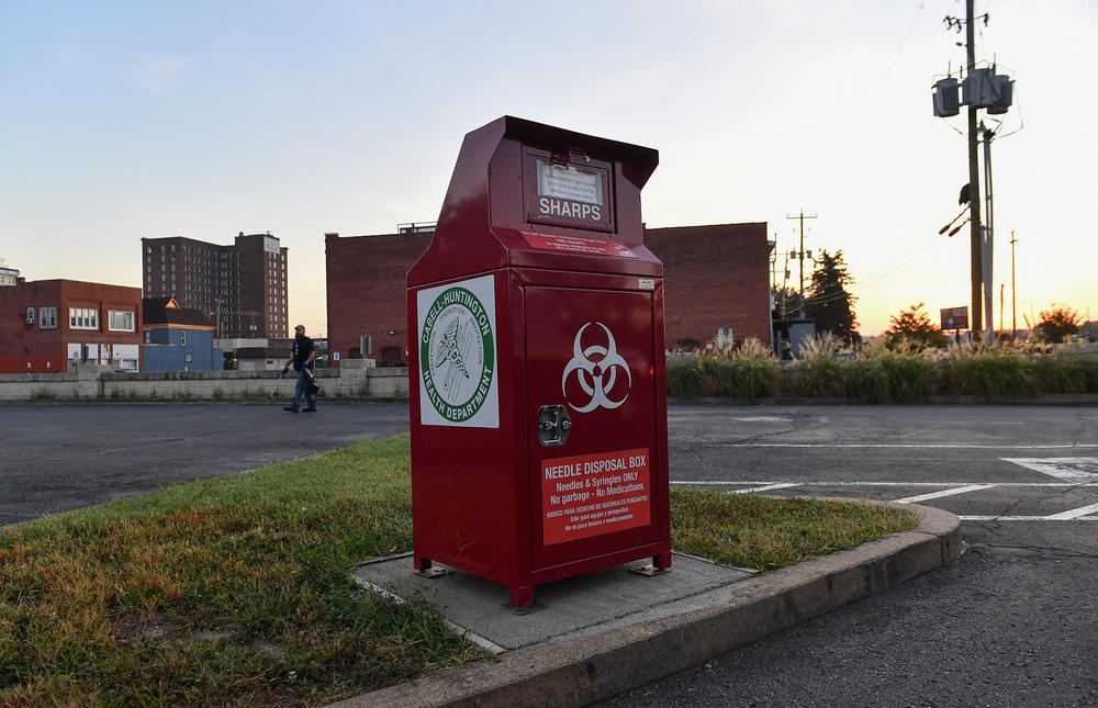 A needle disposal box at the Cabell-Huntington Health Department sits in the front parking lot in 2019 in Huntington, W.Va. The city is experiencing a surge in HIV cases related to intravenous drug use following a recent opioid crisis in the state.