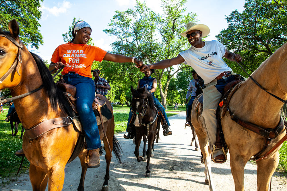This Juneteenth celebration shows people riding horses through Washington Park on June 19, 2020, in Chicago.