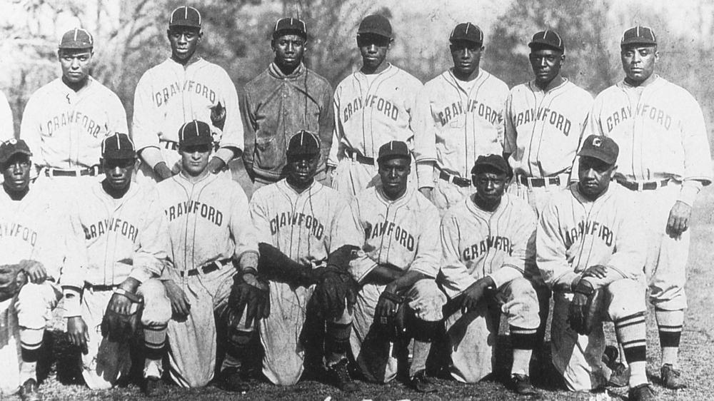 The Pittsburgh Crawfords team of 1932 included future Hall of Famers Satchel Paige (back row, second from left), Josh Gibson (to the right of Paige), and Oscar Charleston (far right). The team is seen here at a spring training site in Hot Springs, Ark.