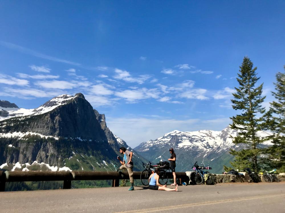 Cyclists take a break on Glacier National Park's Going-To-The Sun road.