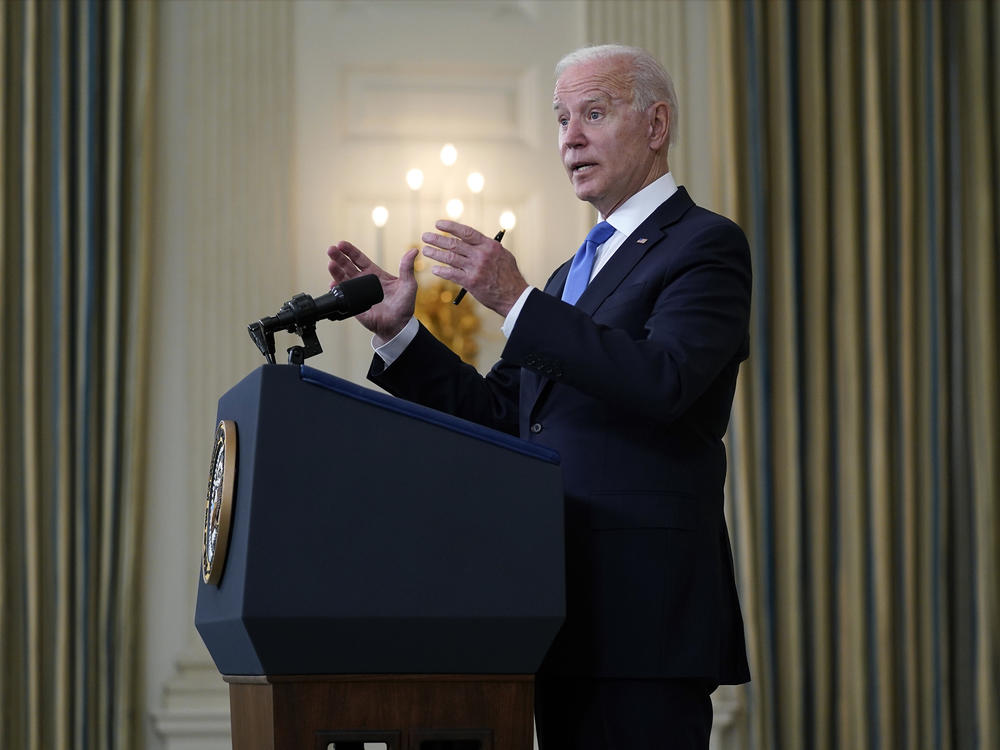 President Joe Biden takes questions from reporters as he speaks about the American Rescue Plan, in the State Dining Room of the White House, Wednesday, May 5, in Washington.
