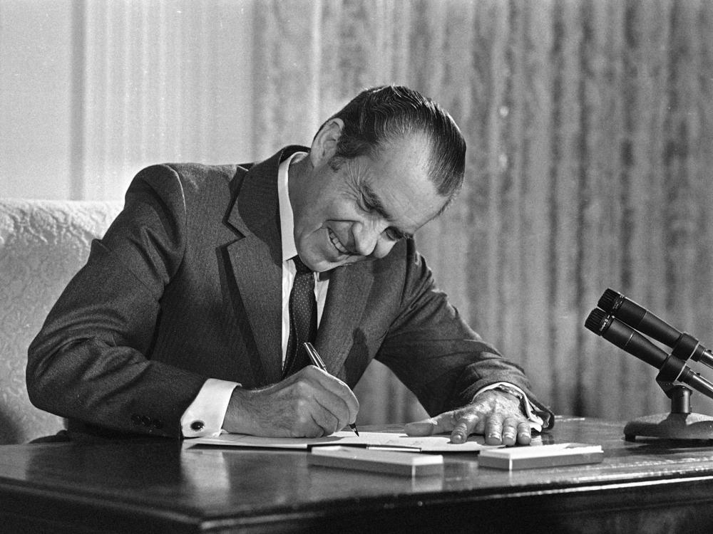 President Richard Nixon signed the National Cancer Act at the White House on Dec. 23, 1971.