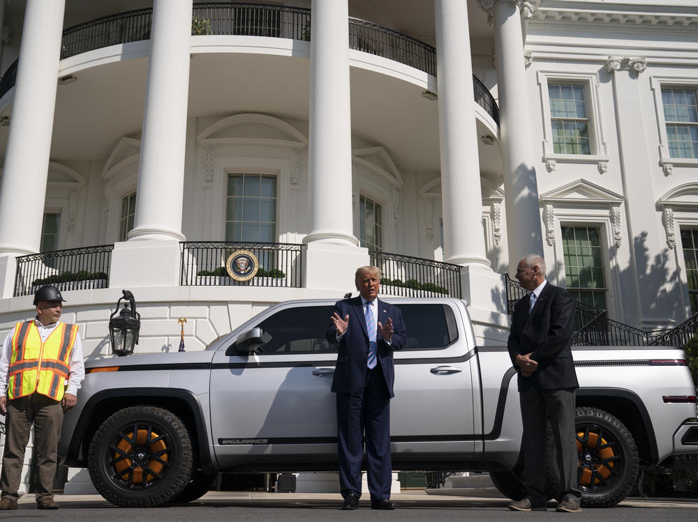 Lordstown Motors CEO Steve Burns listens as President Trump talks about the Endurance pickup truck at the White House on Sept. 28, 2020, in Washington, D.C. Burns stepped down from his post this month.