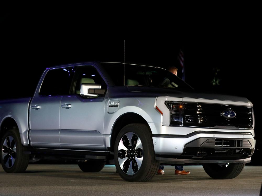 Ford Motor unveils their new electric F-150 Lightning outside of their headquarters in Dearborn, Michigan on May 19. Established auto makers such as Ford are aggressively investing in electric vehicles, stepping tup their competition against the new startups in the industry.