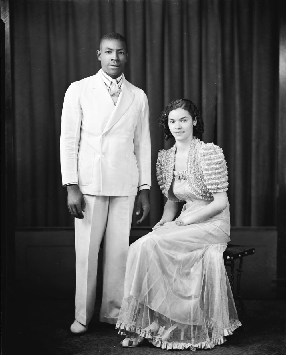A couple poses for a portrait,