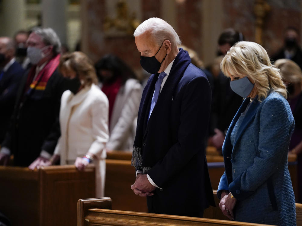 President Joe Biden and his wife, Jill Biden, shown here on Jan. 20, 2021, attend Mass at the Cathedral of St. Matthew the Apostle during Inauguration Day ceremonies in Washington, D.C.