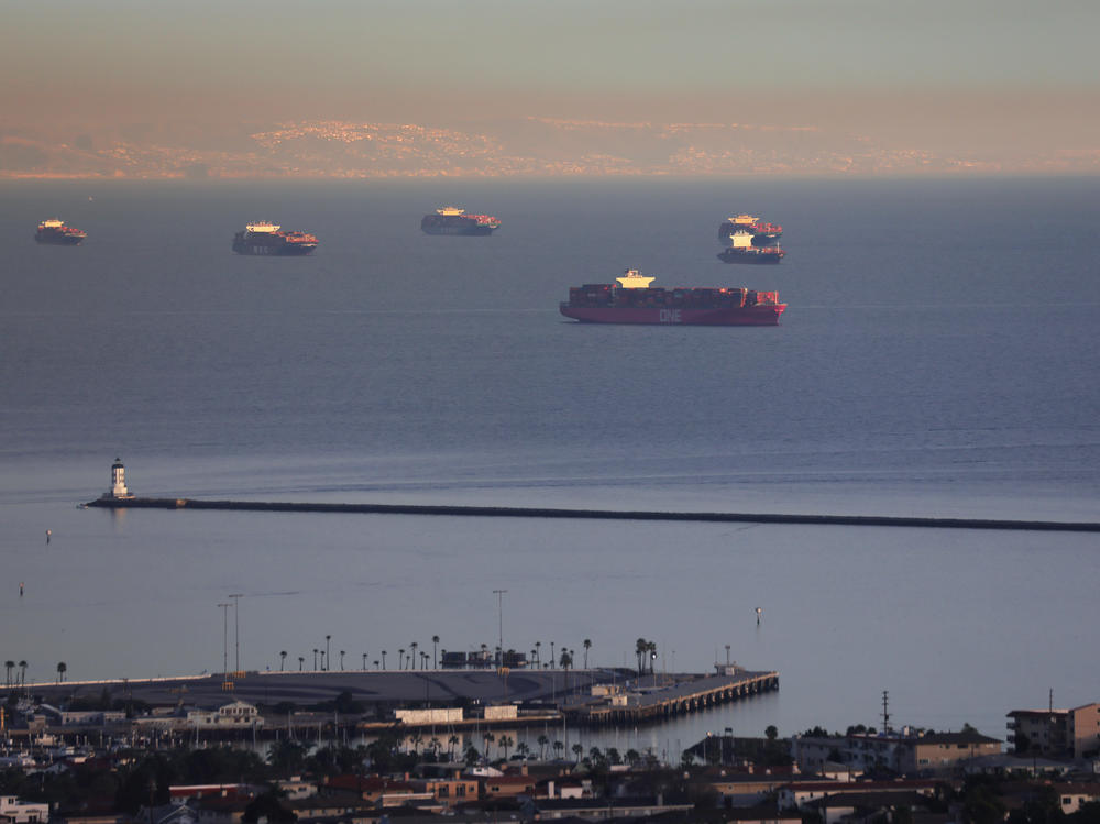 Container ships and tankers are anchored close to the ports of Los Angeles and Long Beach in February. The Port of Los Angeles logged its busiest month in history in May.