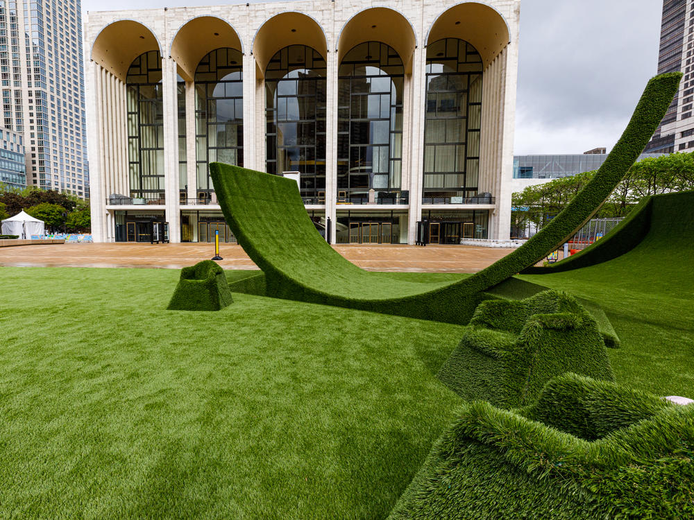 The Lincoln Center campus, presently adorned in a green carpet of synthetic grass, hosts a Juneteenth experience June 19.