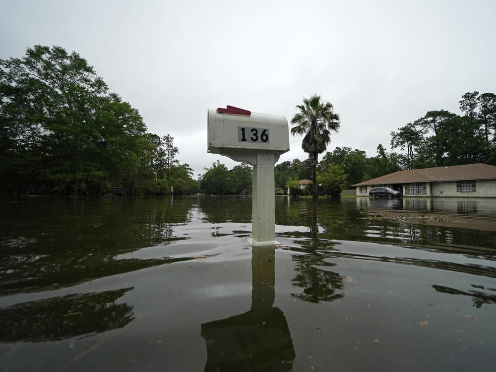 A flooded neighborhood is seen after Tropical Storm Claudette passed through in Slidell, La., Saturday, June 19, 2021.
