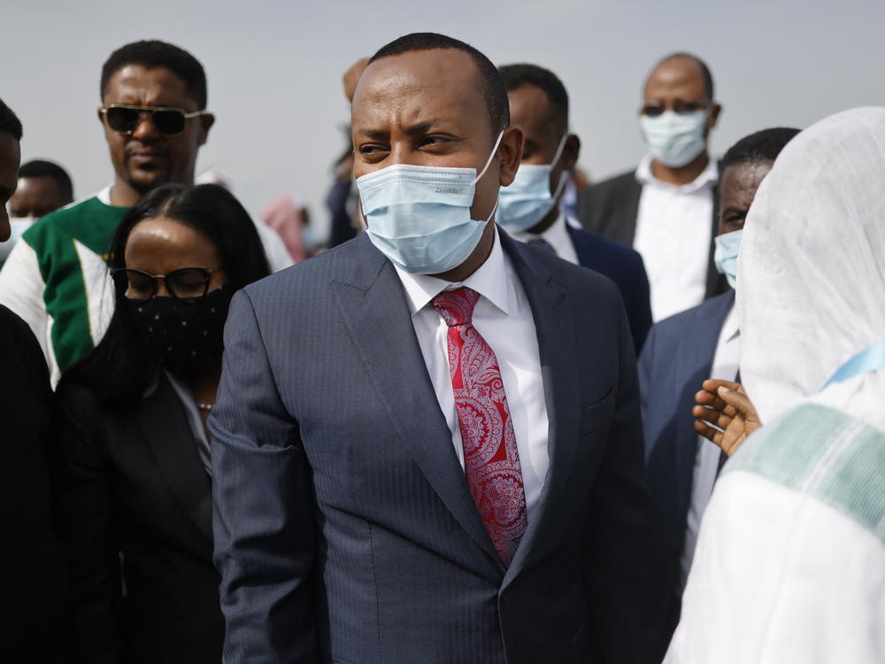 Ethiopian Prime Minister Abiy Ahmed (center) arrives in Jimma last week during a campaign visit ahead of Monday's vote.