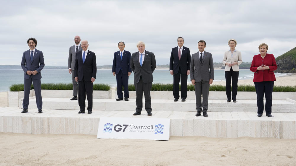 Leaders of the Group of Seven countries pose for a photo by the beach in Carbis Bay, in Cornwall, England, on June 11.