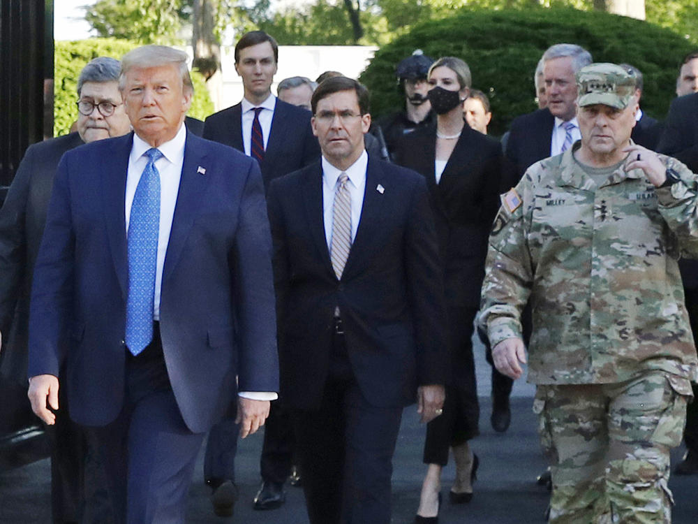 Trump departs the White House to visit outside St. John's Church on June 1, 2020. Walking behind Trump  are then-Attorney General William Barr (from left), then-Defense Secretary Mark Esper and Gen. Mark Milley, chairman of the Joint Chiefs of Staff.