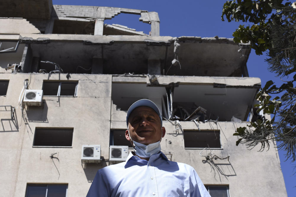 Faysal Shawa is the owner of a large contracting company. Its office building was damaged in the conflict in May.