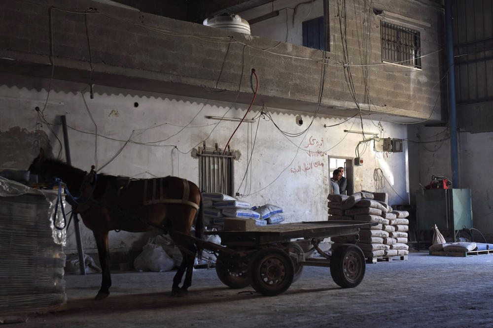 Warehouses in downtown Gaza City sell Egyptian and Israeli cement.
