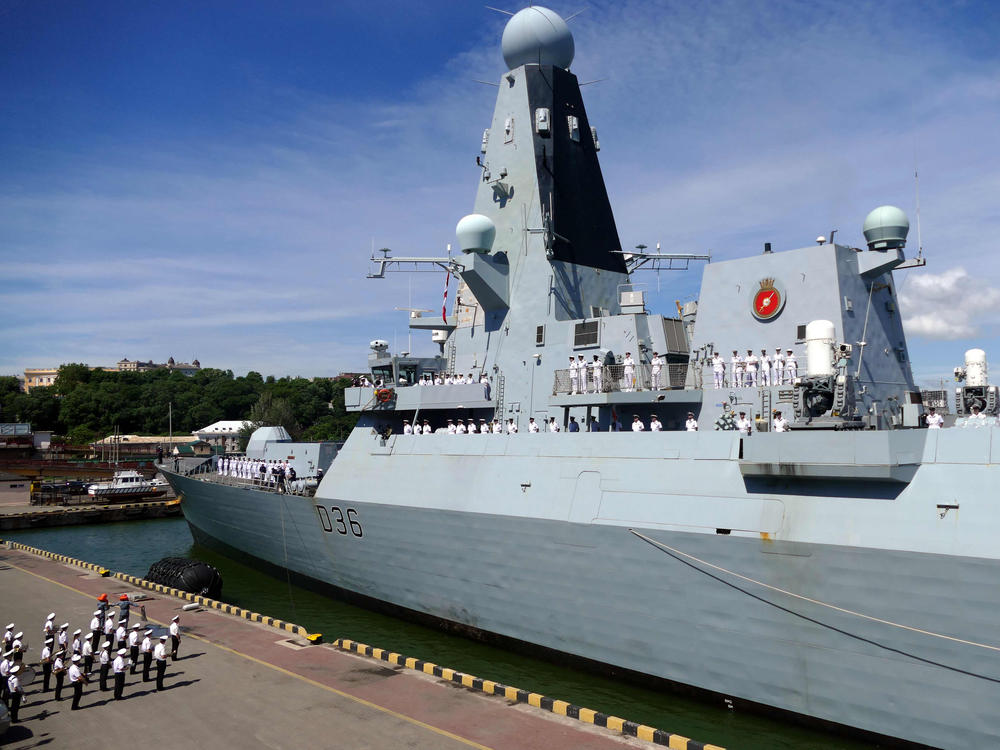 The British Royal Navy destroyer HMS Defender in the port of Odessa, Ukraine, on Tuesday. Russia said it fired warning shots at the warship Wednesday when it entered territorial waters off Crimea.