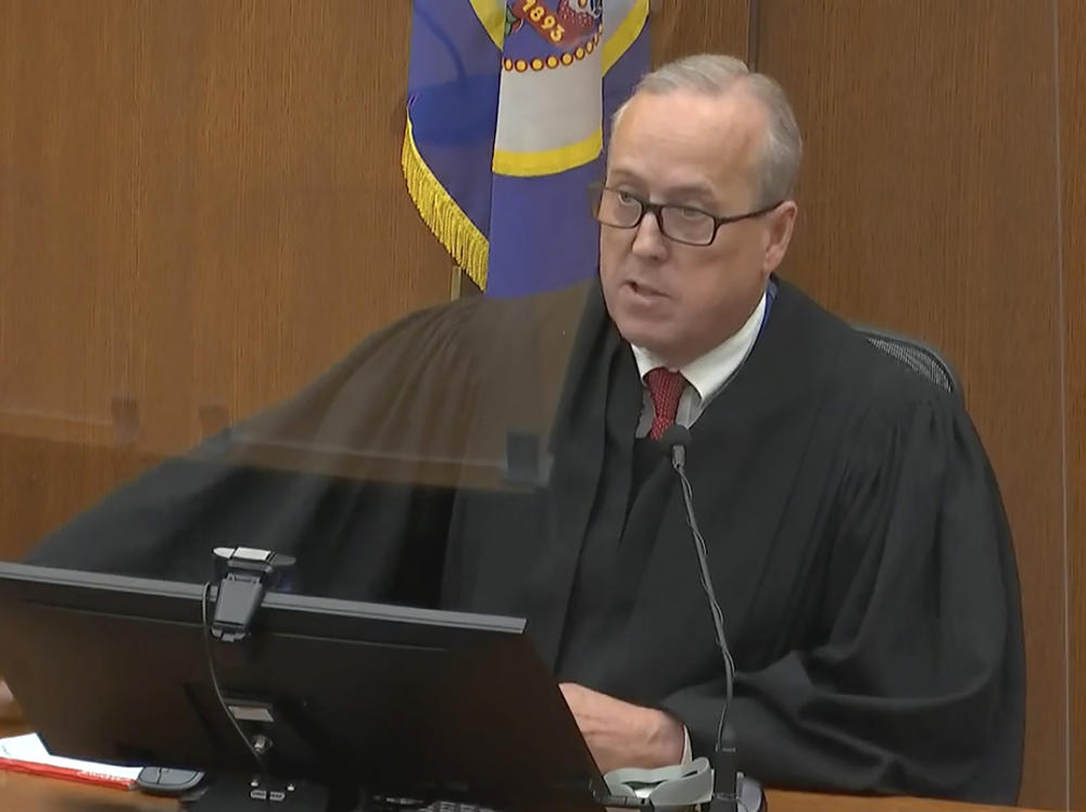 Hennepin County, Minn., Judge Peter Cahill presides over the sentencing of former Minneapolis police officer Derek Chauvin on Friday. He sentenced Chauvin to 22 1/2 years in prison for George Floyd's murder.