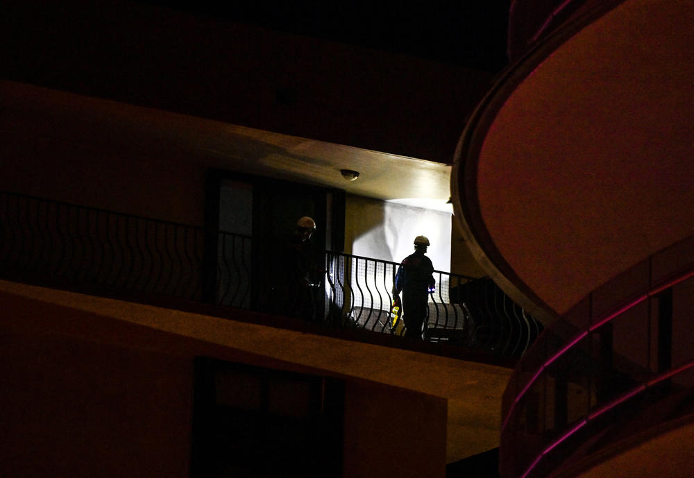 Rescue personnel work at the site on Thursday.