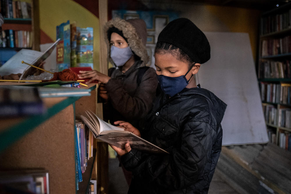 Bernalee Victor, 12, is a daily visitor at the Hot-Spot library. Her favorite book so far, she says, is an adaptation of the TV movie <em>High School Musical.</em>