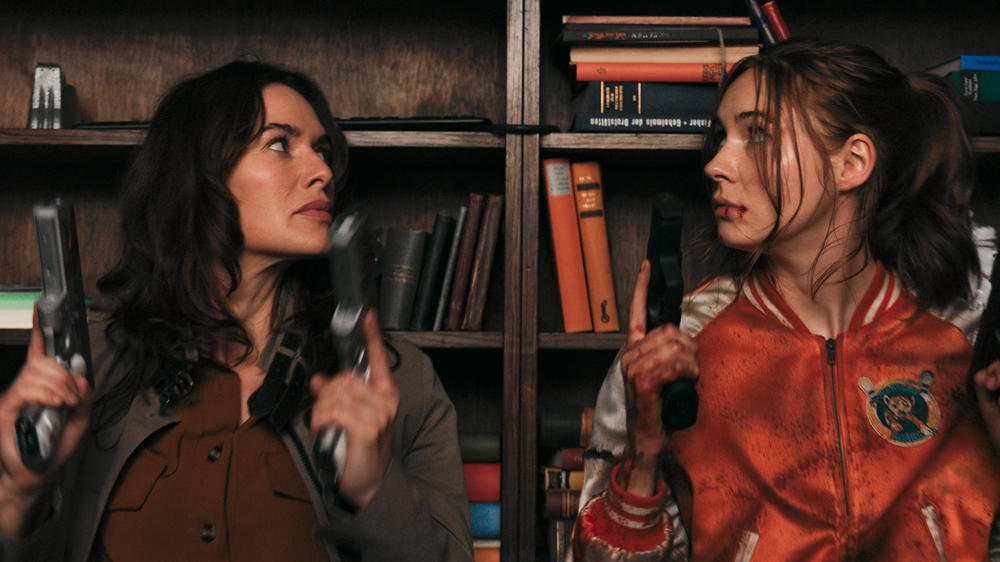 Lena Headey and Karen Gillan in Netflix's <em>Gunpowder Milkshake</em>.