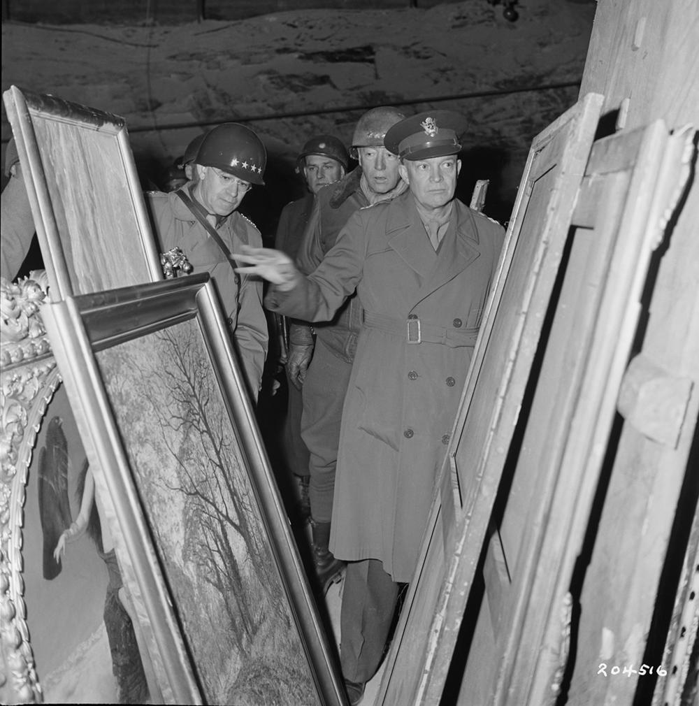 Generals Dwight D. Eisenhower, Omar N. Bradley and George S. Patton inspect art found in the Merkers salt mine on April 12, 1945.