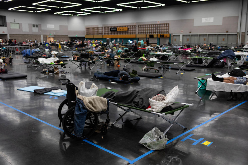The Pacific Northwest has a lack of air conditioners as hot weather is not typical. Here, Portland, Oregon residents stay at a cooling center.