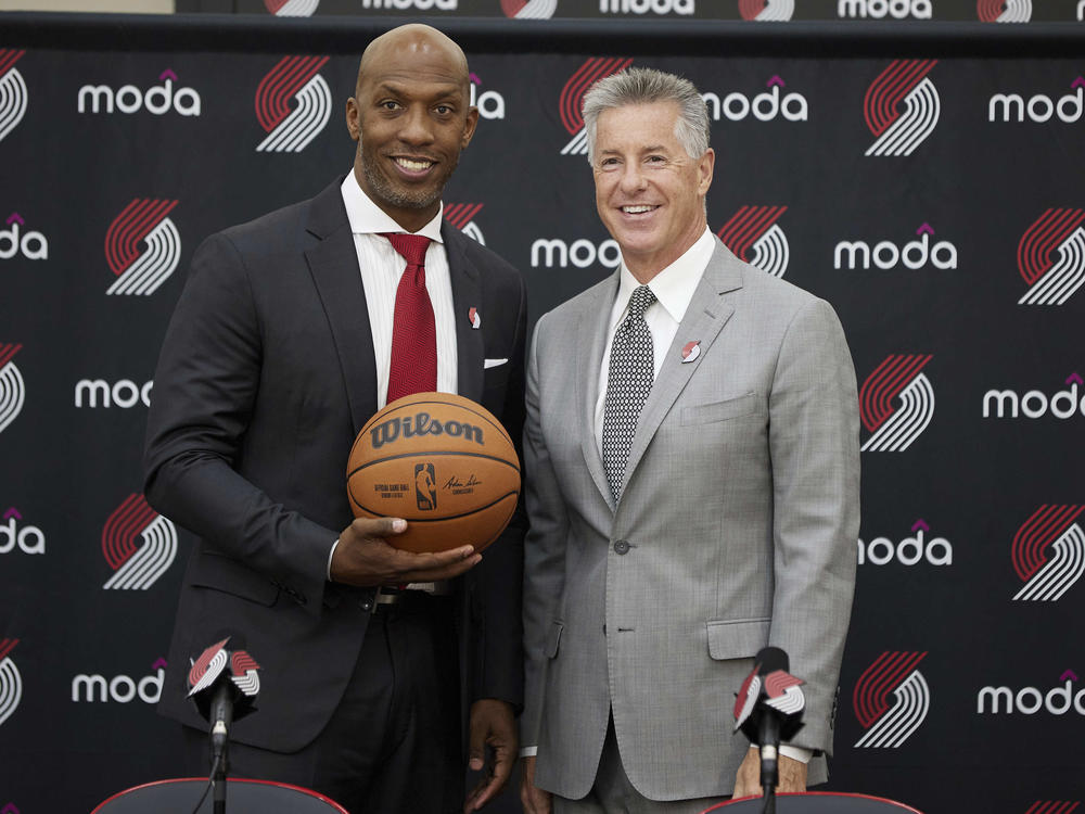 Chauncey Billups, left, poses with Portland General Manager Neil Olshey after Billups was announced as the head coach of the Portland Trail Blazers at the team's practice facility on June 29, 2021.