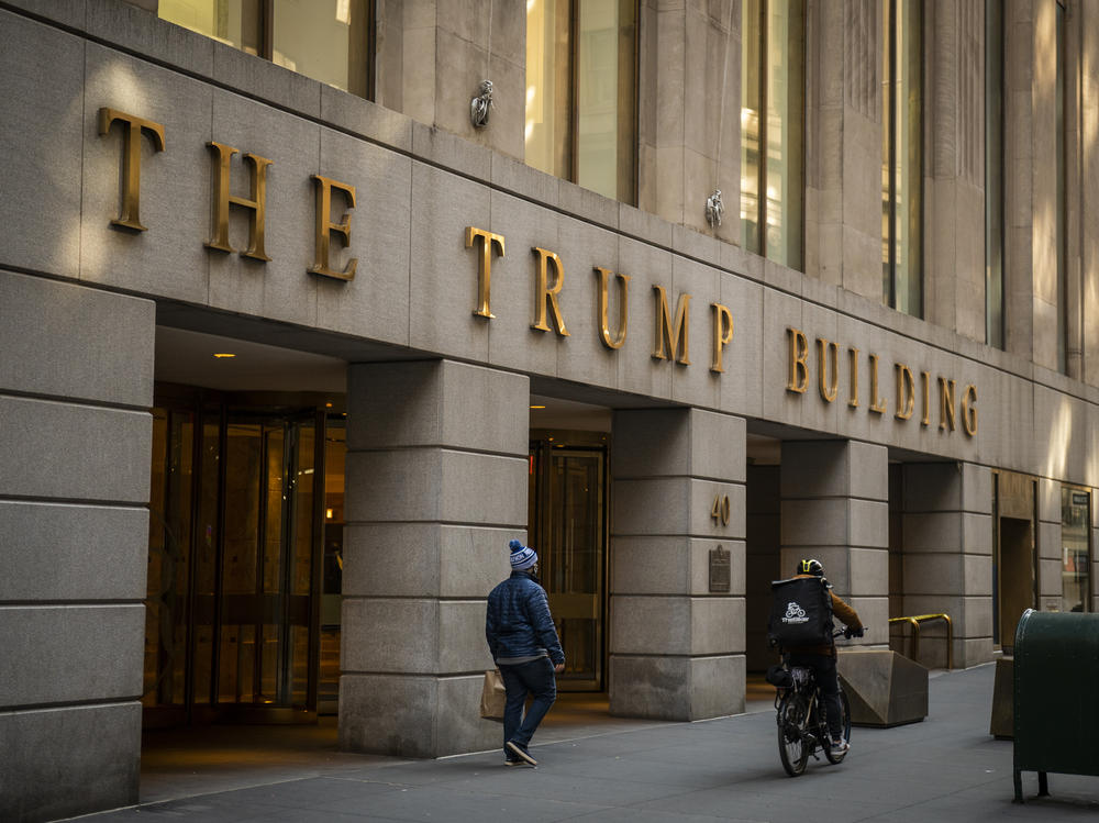 A pedestrian walks past the Trump Building in New York City in January.
