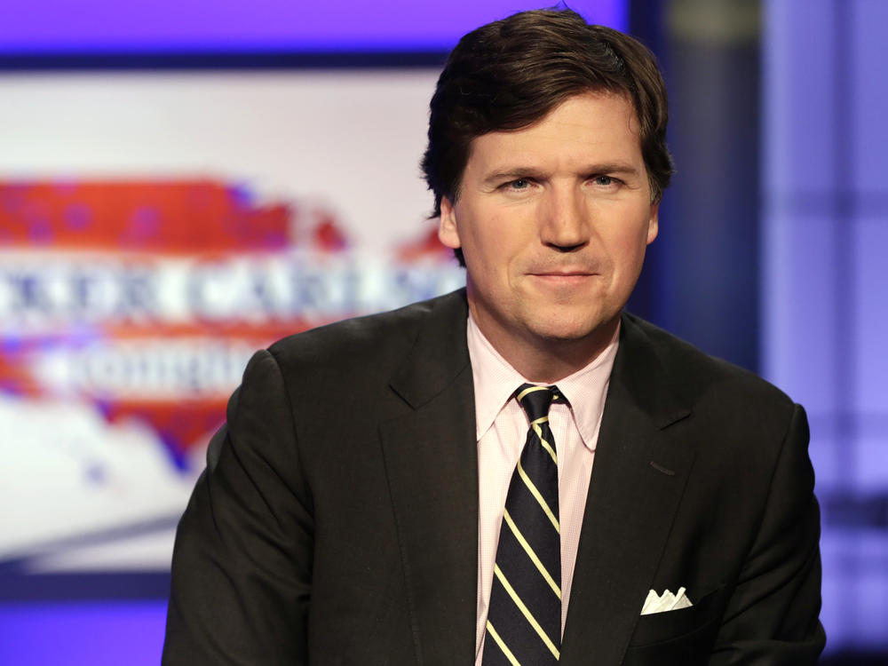 Tucker Carlson, host of <em>Tucker Carlson Tonight</em>, on the set of his Fox News program in 2017.