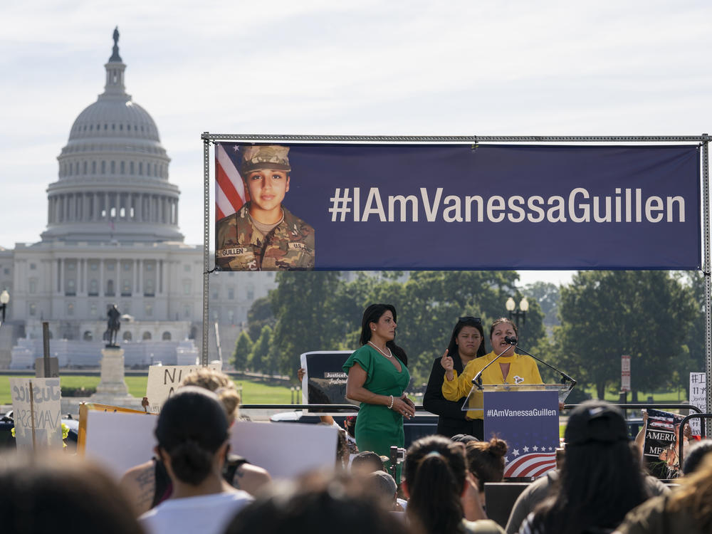 Guillén's mother, Gloria Guillén (right), and a sister, Lupe Guillén (center), speak about the slain soldier at a July 2020 news conference on Capitol Hill.