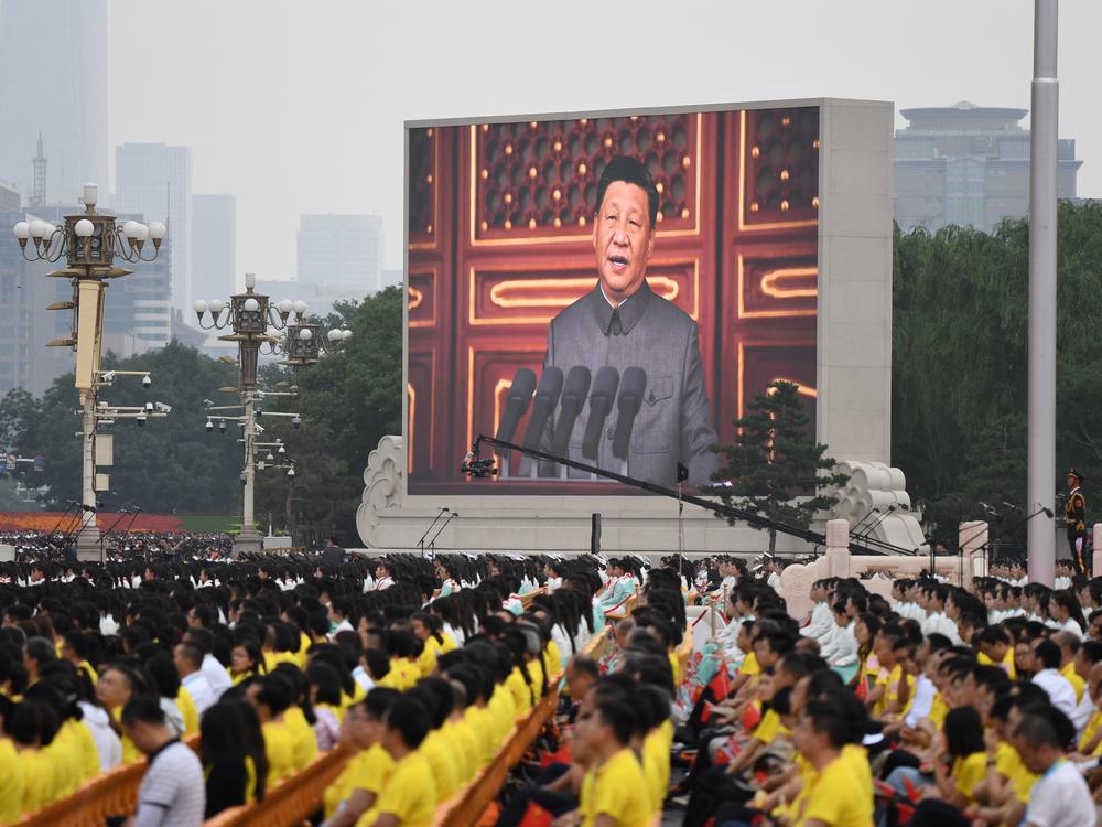 Chinese President Xi Jinping delivers a speech Thursday during the celebrations of the 100th anniversary of the founding of the Communist Party of China at Tiananmen Square in Beijing.