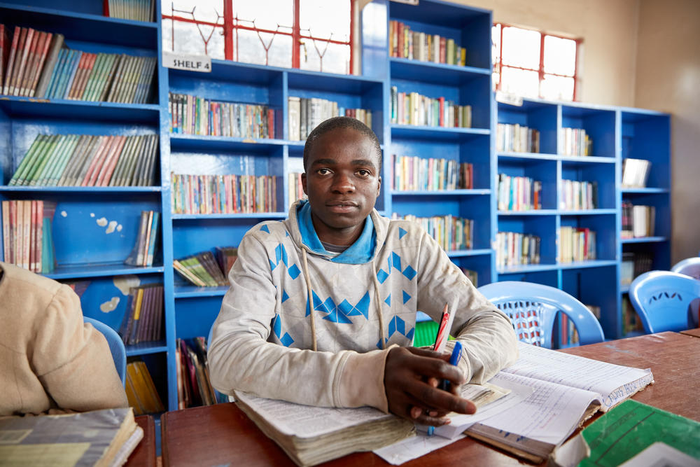 On a day off from school, Calvis was one of about a dozen teenagers hitting the books in a library run by a group called Shining Hope for Our Communities in Kibera, a poor community in Nairobi, Kenya. Calvis says he'd like to see jobs available for friends who are hanging out on the street. He's already decided on his own career: 