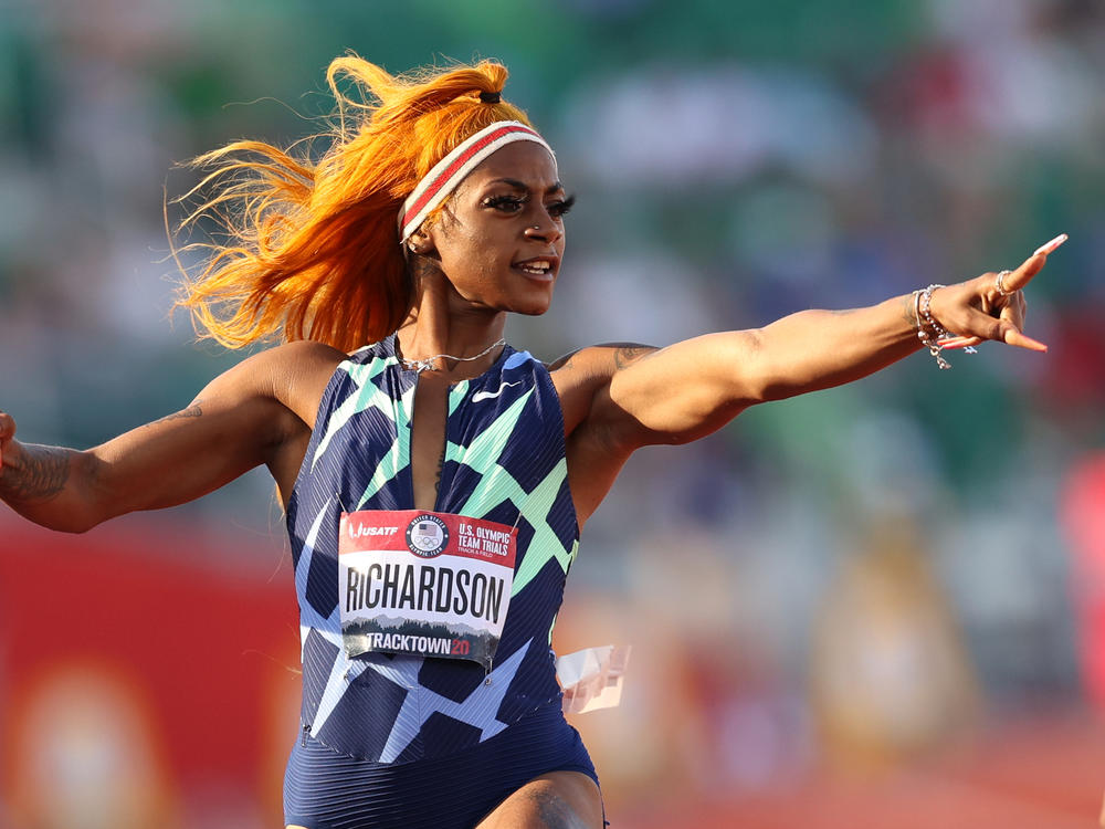 Sha'Carri Richardson celebrates in the 100-meter semifinal last month at the U.S. Olympic track and field team trials in Eugene, Ore. However, a positive drug test disqualified her result at the trials.