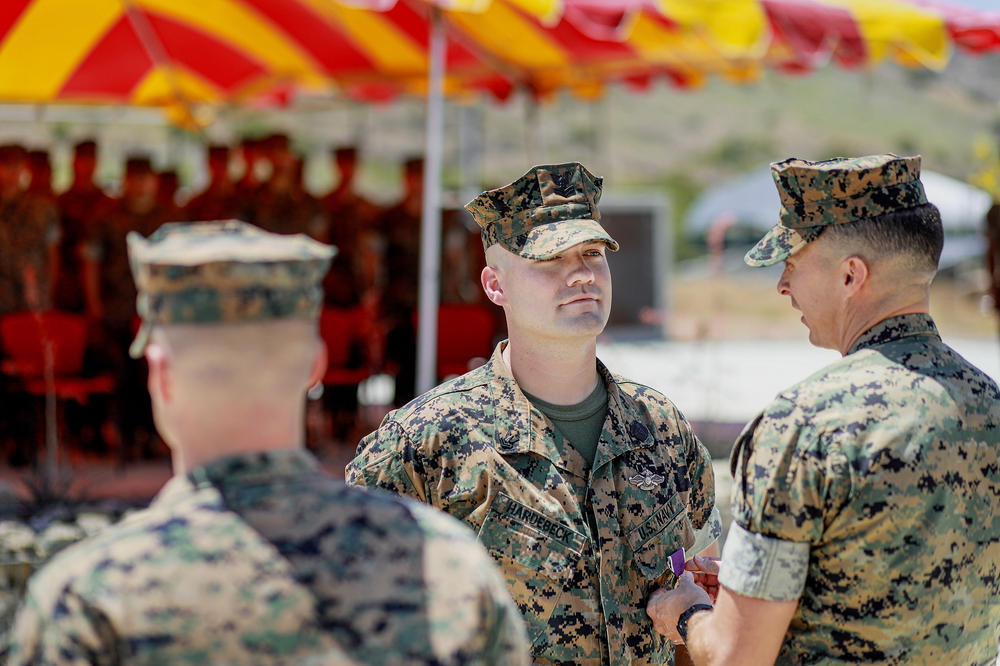 Lt. Col Matthew Ritchie pins a Purple Heart onto Hardebeck during the award ceremony. Originally created by George Washington in 1782 as the Badge of Military Merit, the Purple Heart is presented to service members who are killed or wounded in combat.