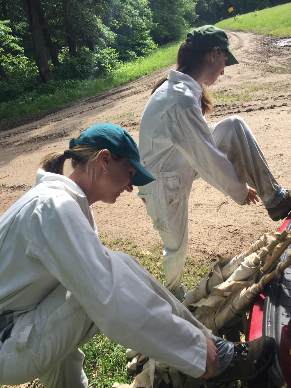 Minnesota Department of Health employees demo a smart hack for keeping critters off while out in the field: Wrap duct tape around socks and pant legs to prevent ticks from crawling in.