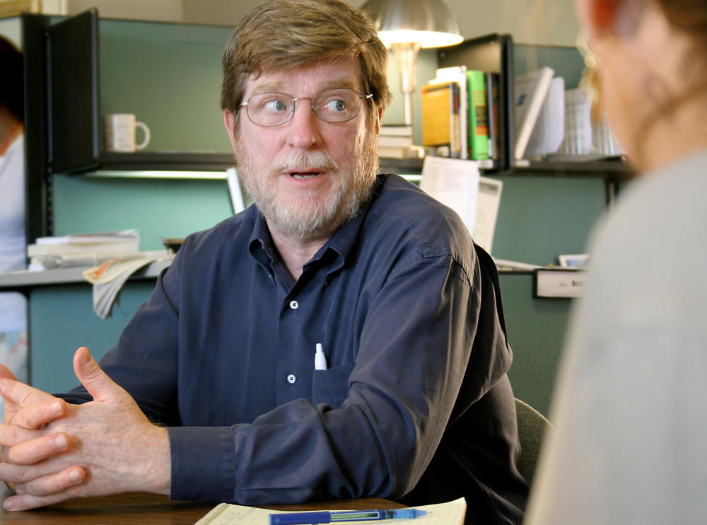 Neal Conan at a <em>Talk of the Nation</em> staff meeting in 2006.
