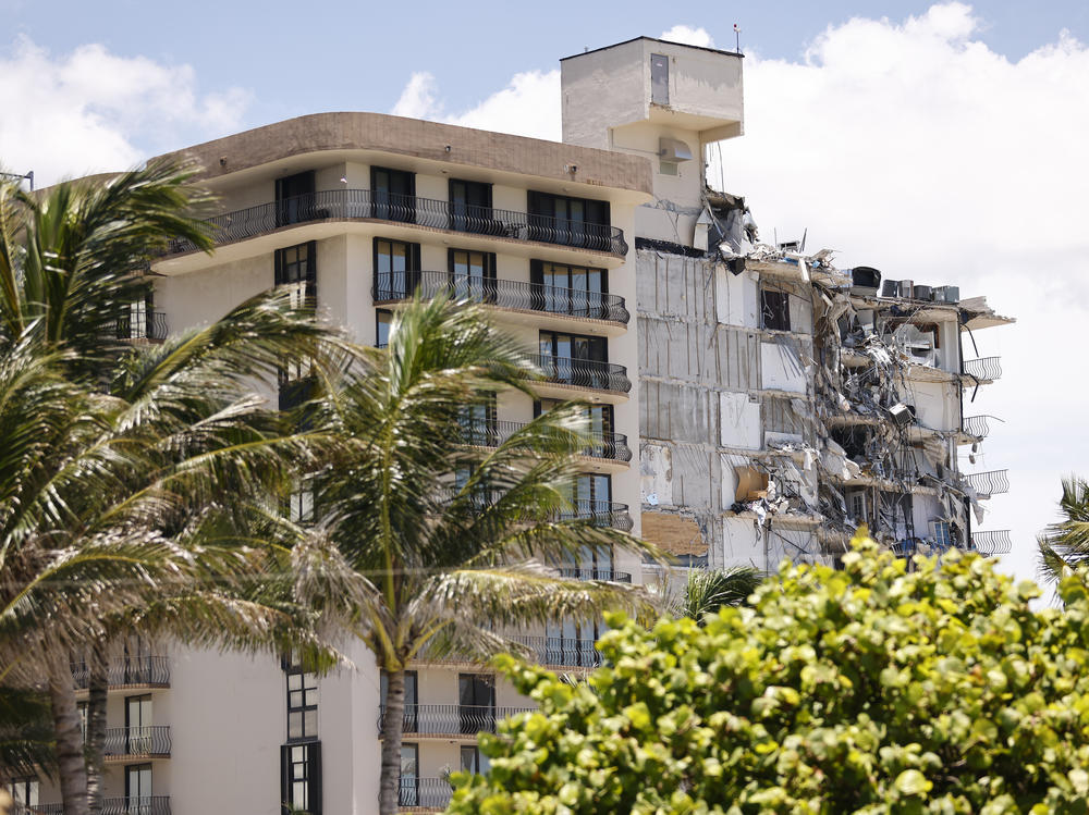 Crews are preparing to demolish the rest of the condo building that partially collapsed in Surfside, Fla., as a storm approaches.