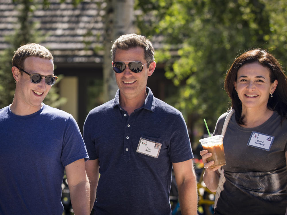 Facebook's CEO Mark Zuckerberg, Vice President of Partnerships Dan Rose and Chief Operating Officer Sheryl Sandberg walk together at the Allen & Company Sun Valley Conference on July 12, 2018 in Sun Valley, Idaho. Top tech and media moguls descend on the resort every year for a week of activities - and deals.