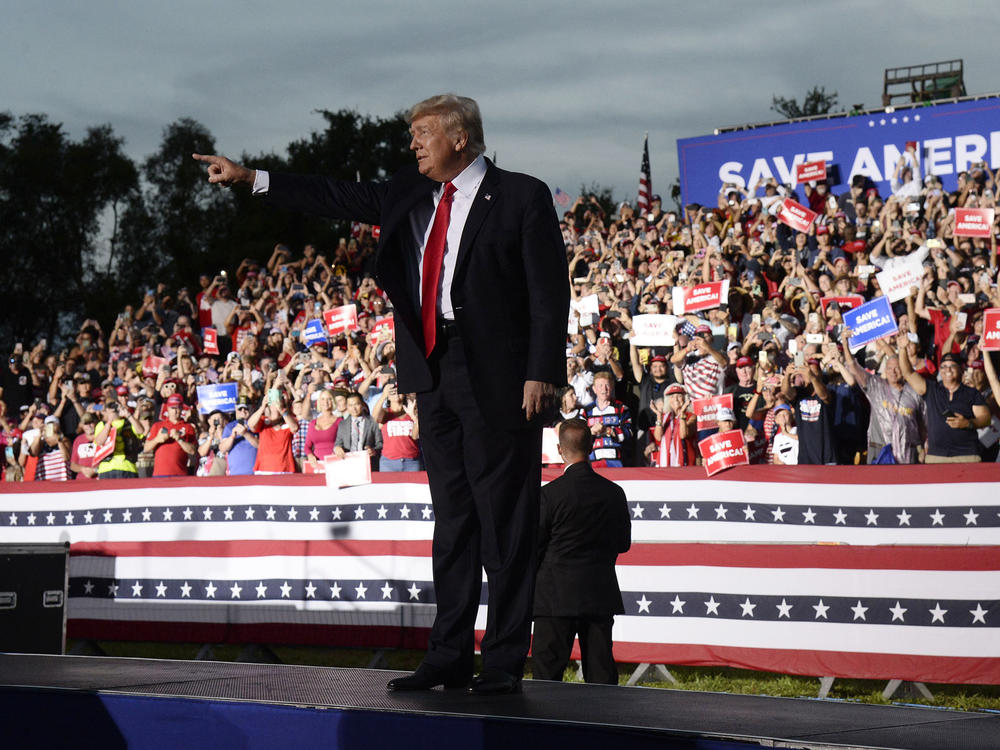 Former President Donald Trump has announced that he is suing three of the country's biggest tech companies: Facebook, Twitter and Google's YouTube. Here, he walks onstage during a rally on July 3 in Sarasota, Fla.