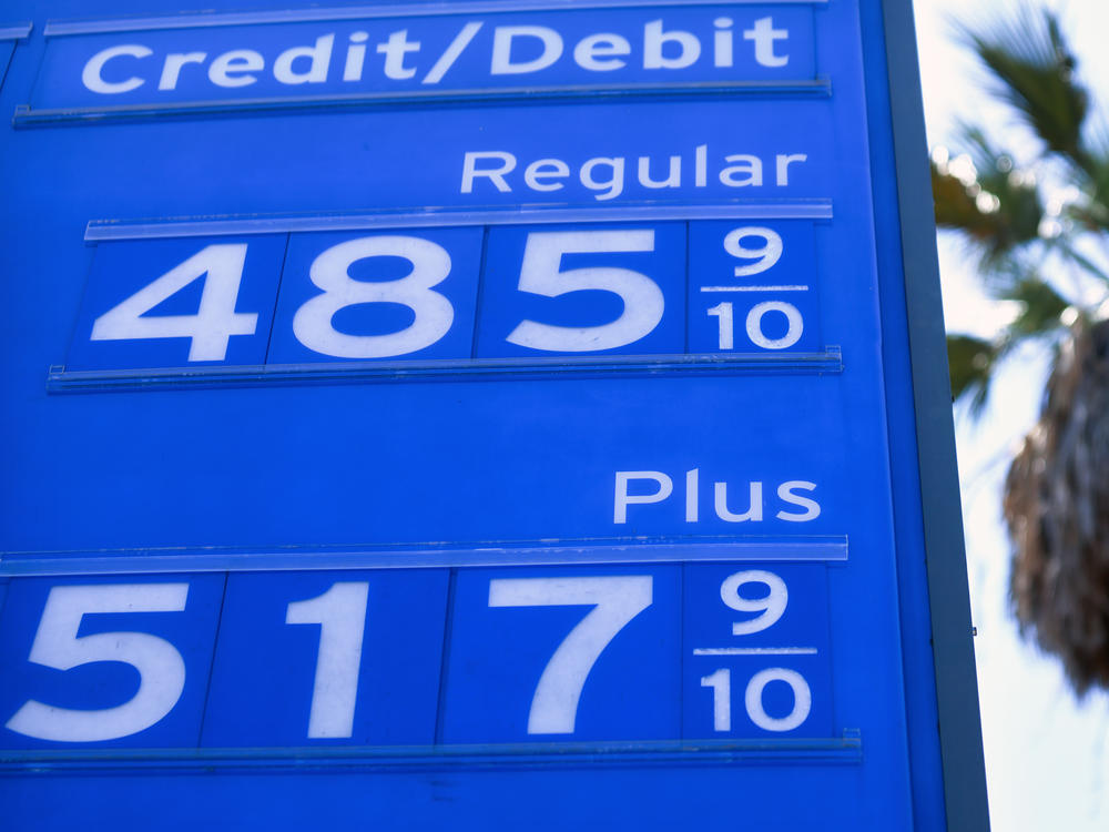 Gas prices are displayed at a Chevron station on June 14 in Los Angeles. A meeting of the oil cartel known as OPEC+ ended in drama, leading to intense volatility in crude prices.