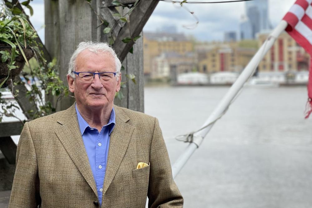 George Dailey, author of <em>Great Pubs of London</em>, stands on the deck of The Mayflower Pub. He says the reason pubs have such a cozy, lived-in feel is because they began in people's homes.