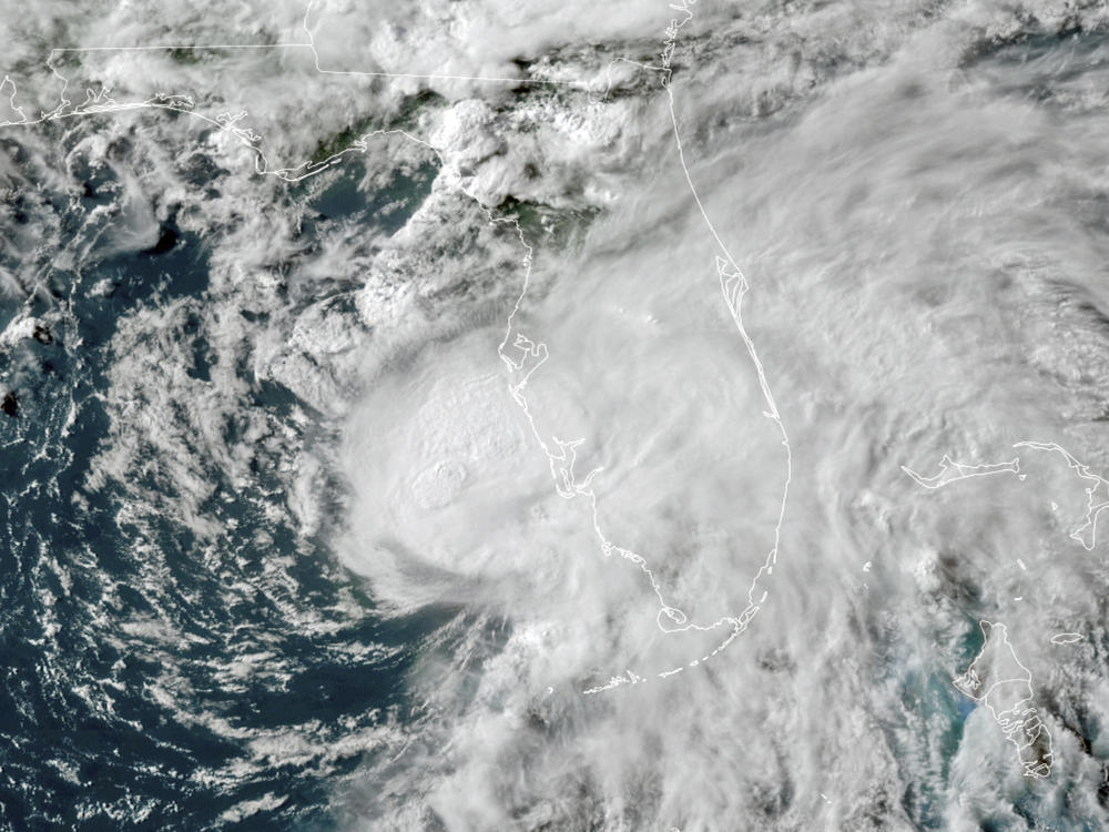 In addition to damaging winds and heavy rains, the Miami-based U.S. National Hurricane Center warned of life-threatening storm surges, flooding and isolated tornadoes from Tropical Storm Elsa.