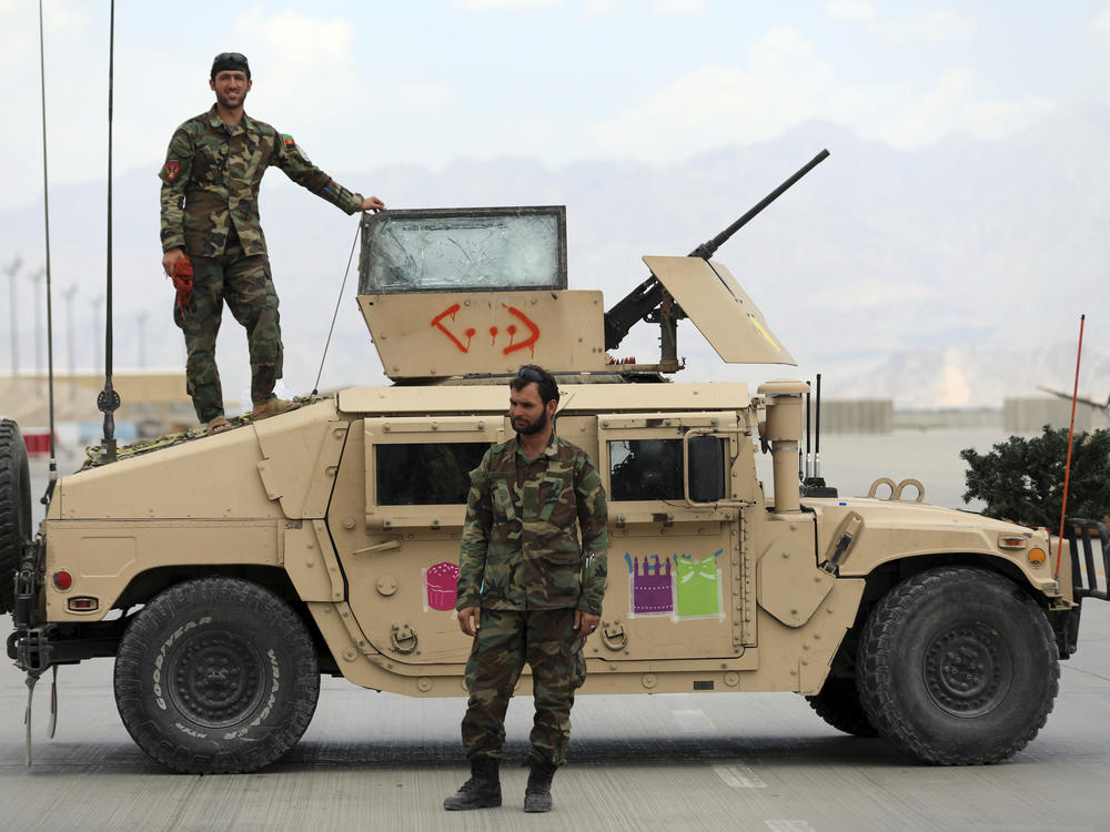 Afghan soldiers stand guard after the American military left the Bagram Airfield, north of Kabul, on July 5. While the U.S. military is now largely gone from Afghanistan, the CIA is still monitoring the Taliban and developments in the country, though under much more difficult circumstances.