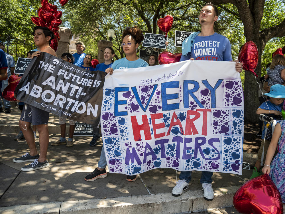 Anti-abortion-rights protesters come out in May to the Texas Capitol in Austin in response to a bill that Gov. Greg Abbott signed outlawing abortions after a fetal heartbeat is detected.