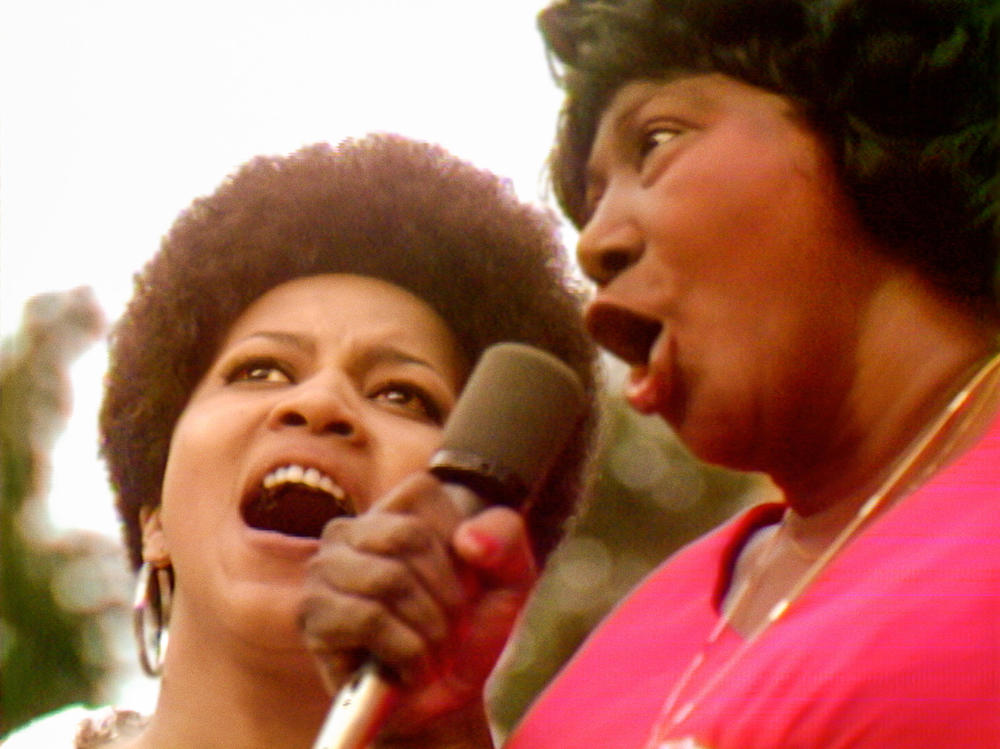 Mavis Staples and Mahalia Jackson perform at the 1969 Harlem Cultural Festival in <em>Summer of Soul.</em>