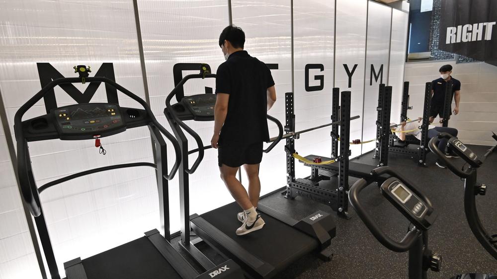 People exercise at a gym in Seoul on Tuesday as South Korea announced implementation of level 4 social distancing measures amid concerns of a fourth wave of the coronavirus pandemic.