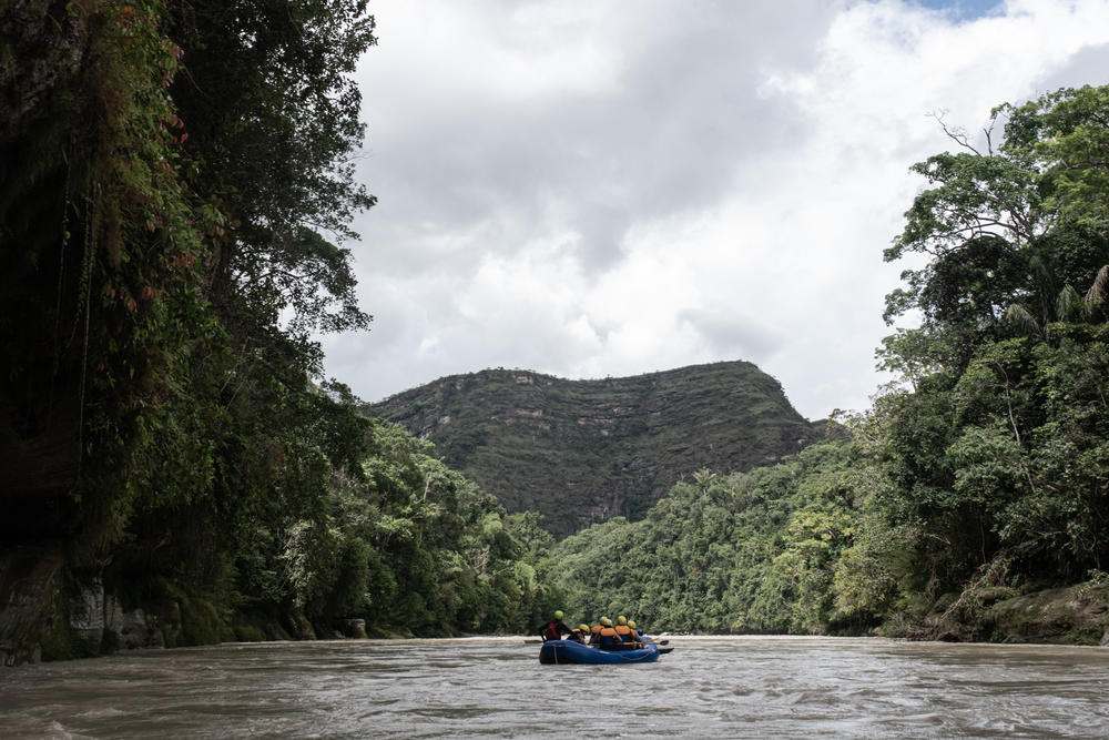 Tourists raft down the Guejar River in an area that used to be controlled by FARC rebels.