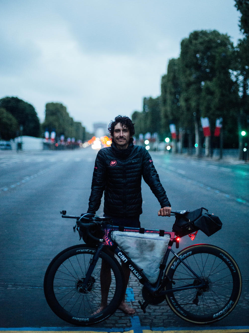 Lachlan Morton rode the whole route of the Tour de France without the kind of help official racers get, like mechanics and meals. He started behind official Tour racers and finished five days ahead.