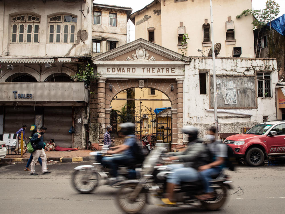 Edward Theatre's entrance, as seen from the street opened in 1914 in Kalbadevi, and was named after King Edward V, who visited Mumbai the same year. It initially started with stage plays, with a total of 509 wooden seats, distributed between three separate levels. Until a few years ago, the theatre turned cinema hall, played mostly B- grade Bollywood films.